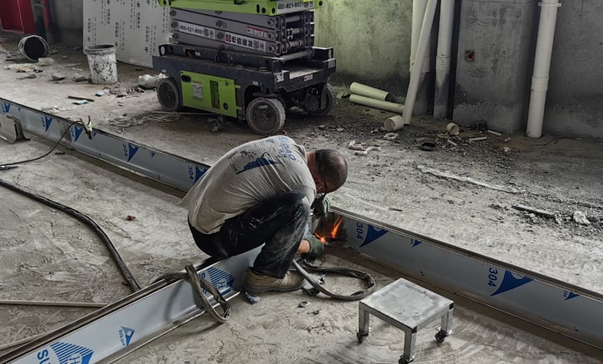 Two Men Working in a Factory